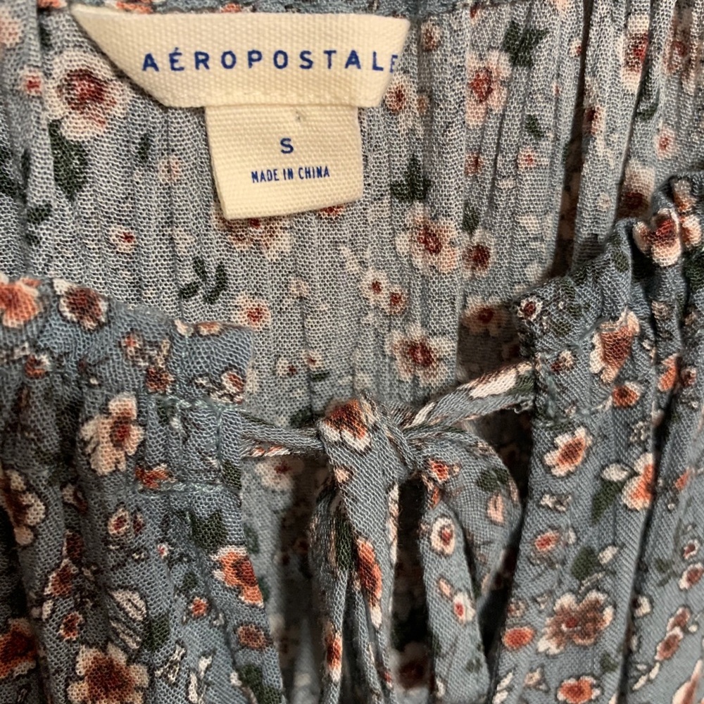 Floral off the shoulder shirt